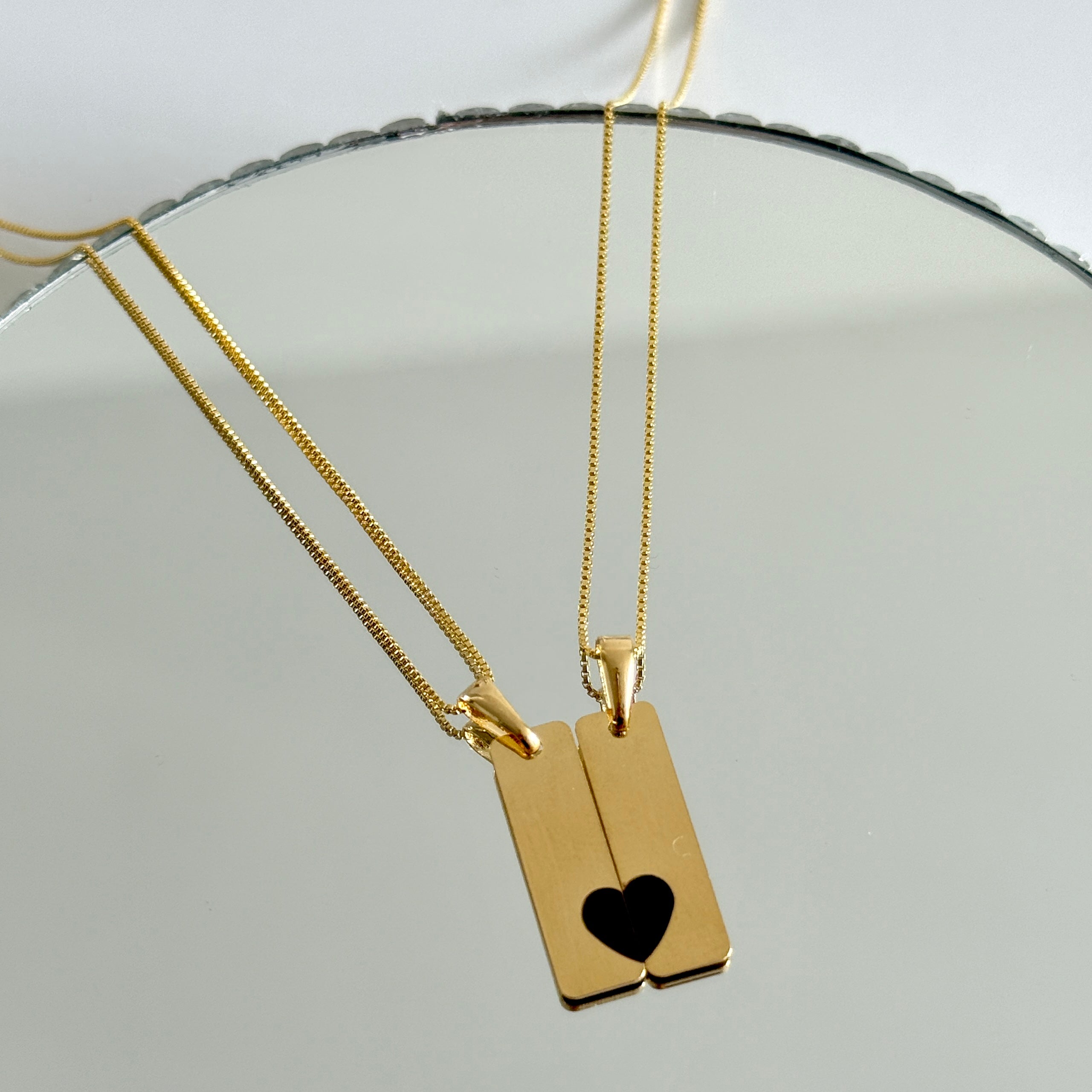 Dije placa dúo corazón