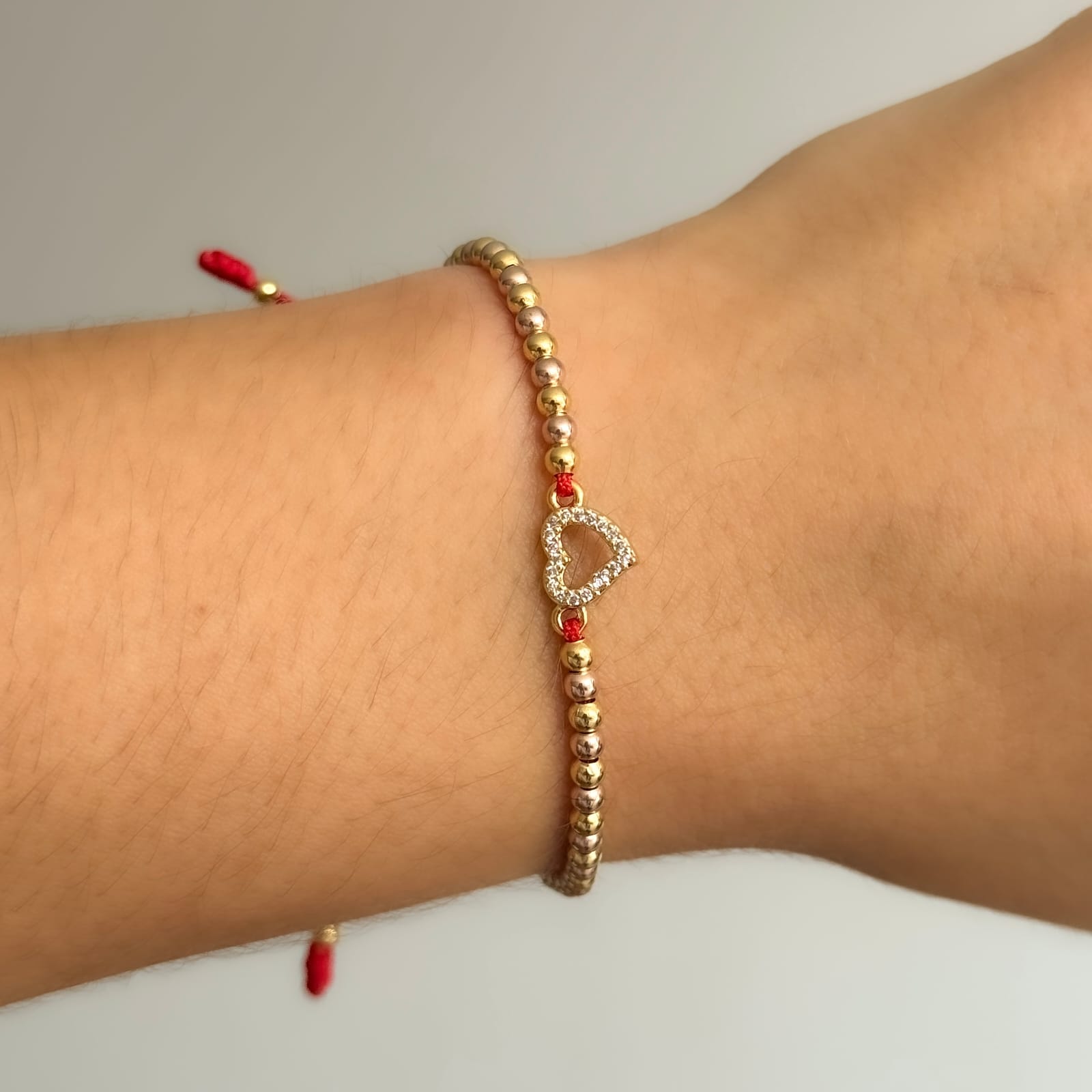 Pulsera artesanal corazón balines